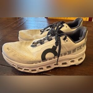 On Running White and Black Sneakers with Black and White Polka Dot Laces